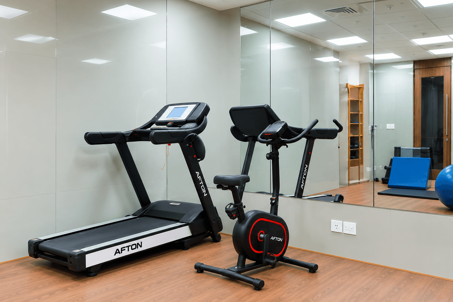 Treadmill and stationary bike in the cardio conditioning area